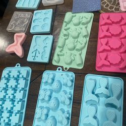 Silicone Molds. Different shapes are 62 pieces. Like 20 of thick material.Make Me Offer