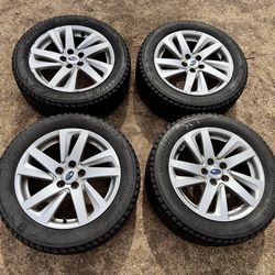 Subaru Enkei wheels with 205 55 16 Bridgestone Blizzak WS90 tires