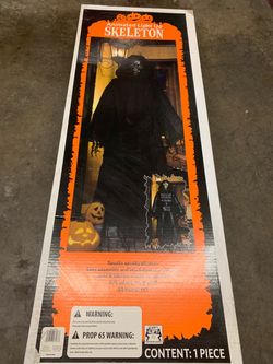 BRAND NEW IN BOX, 63” TALL SKELETON/LIGHT/MOTION ACTIVATED