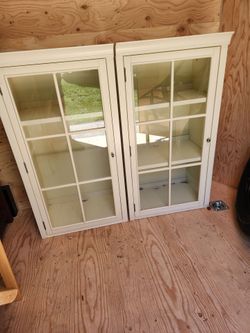 2 white display cabinets storage Cabinets for Sale in Manteca
