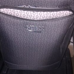 Guess Brand Carryon Luggage Black Has Wheels And Extending pullup Handle