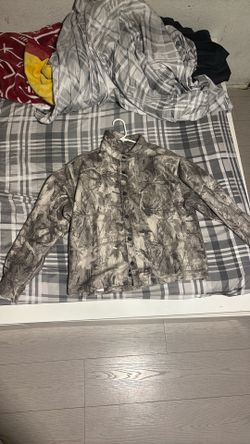 Boxy fit camouflage button up.
