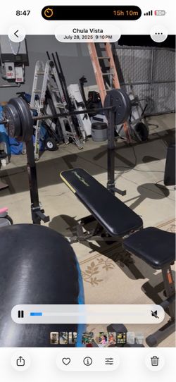 Weight Bench with Barbell and Plates