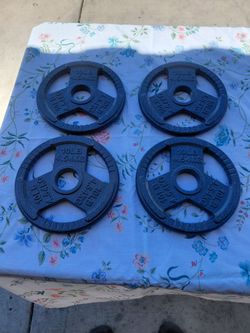 Four 10lbs Olympic grip plates