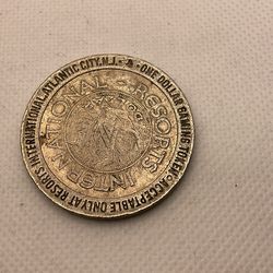 1987  RESORTS INTERNATIONAL  CASINO TOKEN - One Dollar