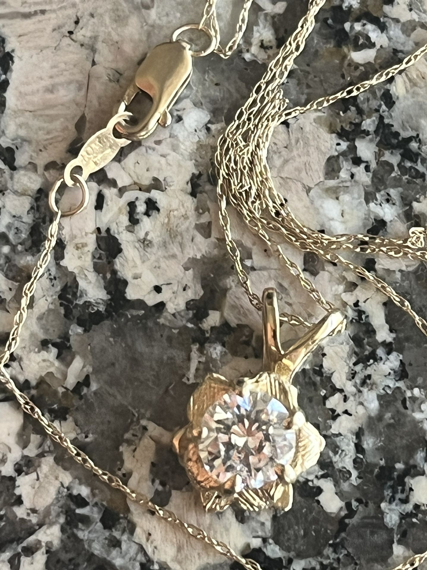 10k Gold chain with a stone