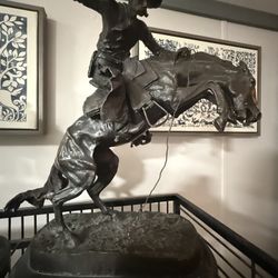 Copyrighted in  1895-  Frederick Remington signed bronze sculpture “Busting Bronco!” 