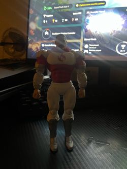 Thragg action figure