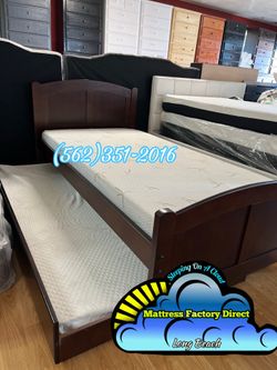 Twin wooden bed with trundle and mattresses colchones