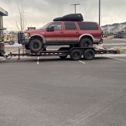 2022  BIG TEX  20’ EQUIPMENT FLATBED TRAILER ON  2-7K AXLES 