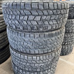 4- LT265-65-18 Cooper AT3 Tires 