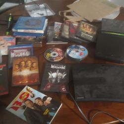 Samsung blu Ray player and 75 Blu Ray & dvd,s and dvd player