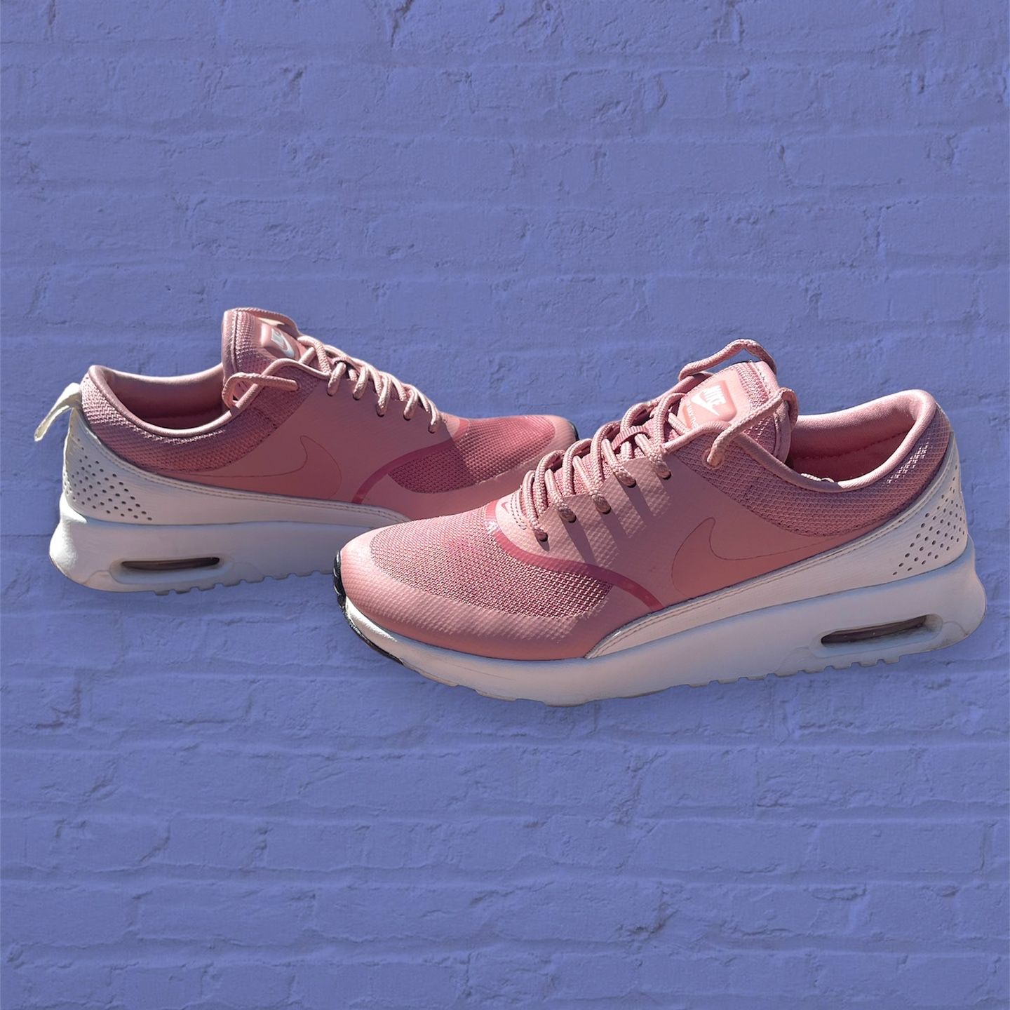 Nike thea pink smoke sale