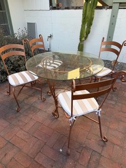 Outdoor rod iron and glass table set