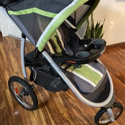 Graco FastAction Fold Jogger Travel System | Includes the FastAction Fold Jogging Stroller and SnugRide 35 Infant Car Seat