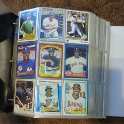 Binders of sports cards.