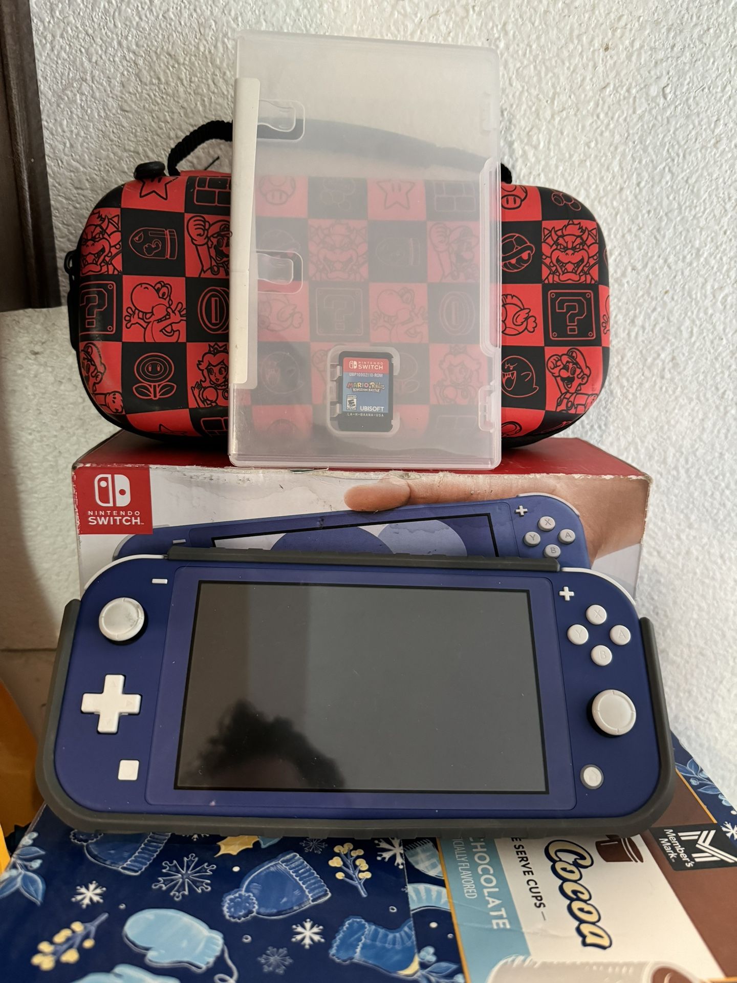 Complete Switch Lite Bundle With 1 Game And Mario Case ‘TRADE IN OLD GAMES FOR A DISCOUNT’