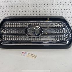 2016 2020 TOYOTA TACOMA FRONT GRILLE BLACK OEM