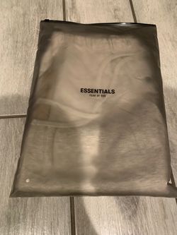 Light oatmeal fear of God essentials shorts L