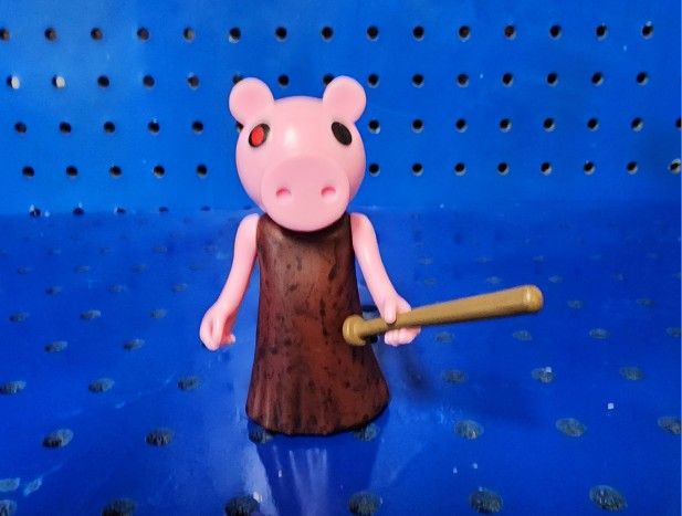 Piggy Figure Of Dinopiggy