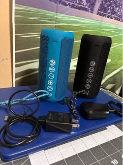 Ortizan X10 Portable Bluetooth Speaker Featuring Blue Casing And A Matching Blue Lanyard...