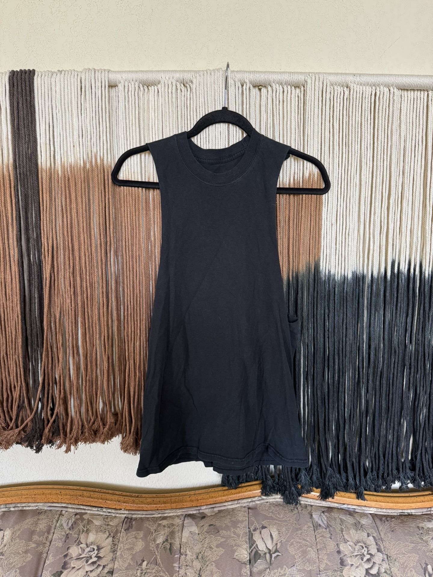 Black cut off tank top; excellent condition