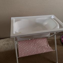 Changing table with bathtub