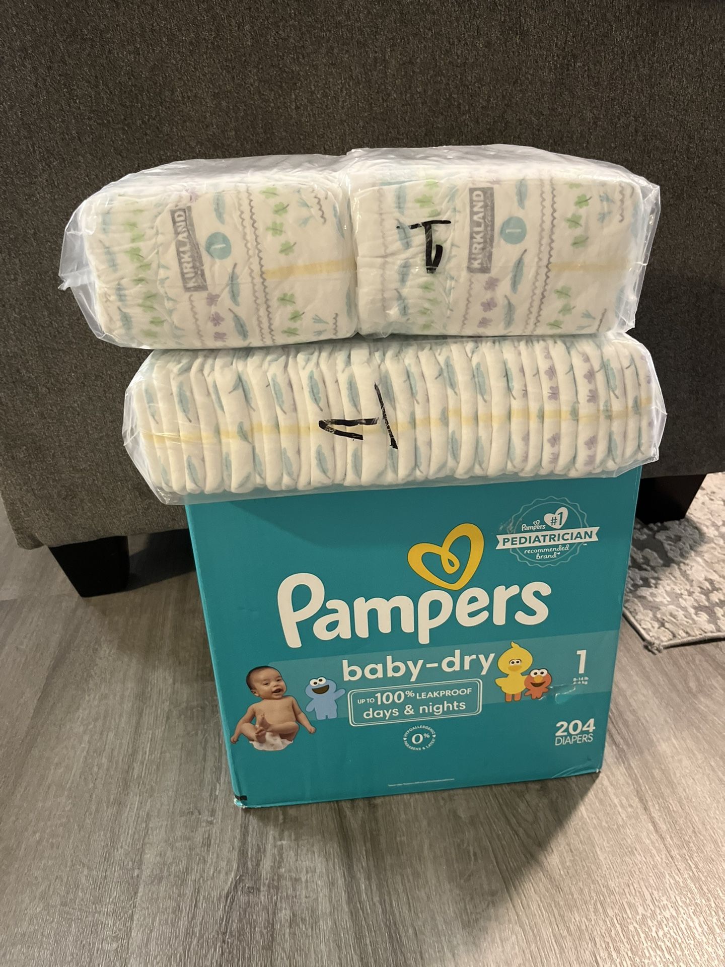 Pampers and Kirklands - Size 1 Diapers