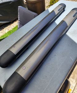 Yakima Fatcat Roof Racks with Thule Aero Cross Bars and Surf Carrier