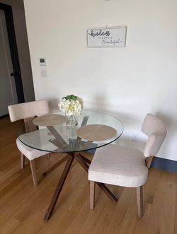Glass Table (Does not include chairs)