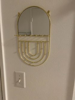 Accent mirror with hooks for keys