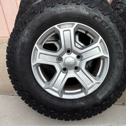 4   245 70 R17  Cooper Discovery ATP and 1 spare Bridgestone Dueler 