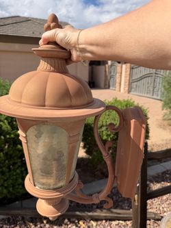 Tuscan-style outdoor lantern fixtures.