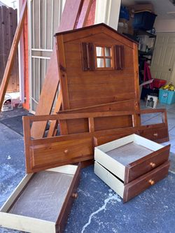 Twin bed with drawers and pullout bed