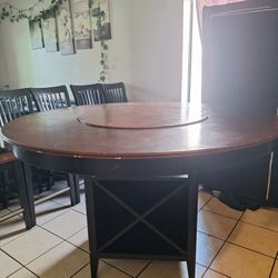 Large Solid Wood Table With Built In Storage, Rotating Center, And Chairs