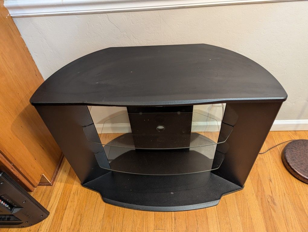 black media console/TV stand with 2 glass shelves.