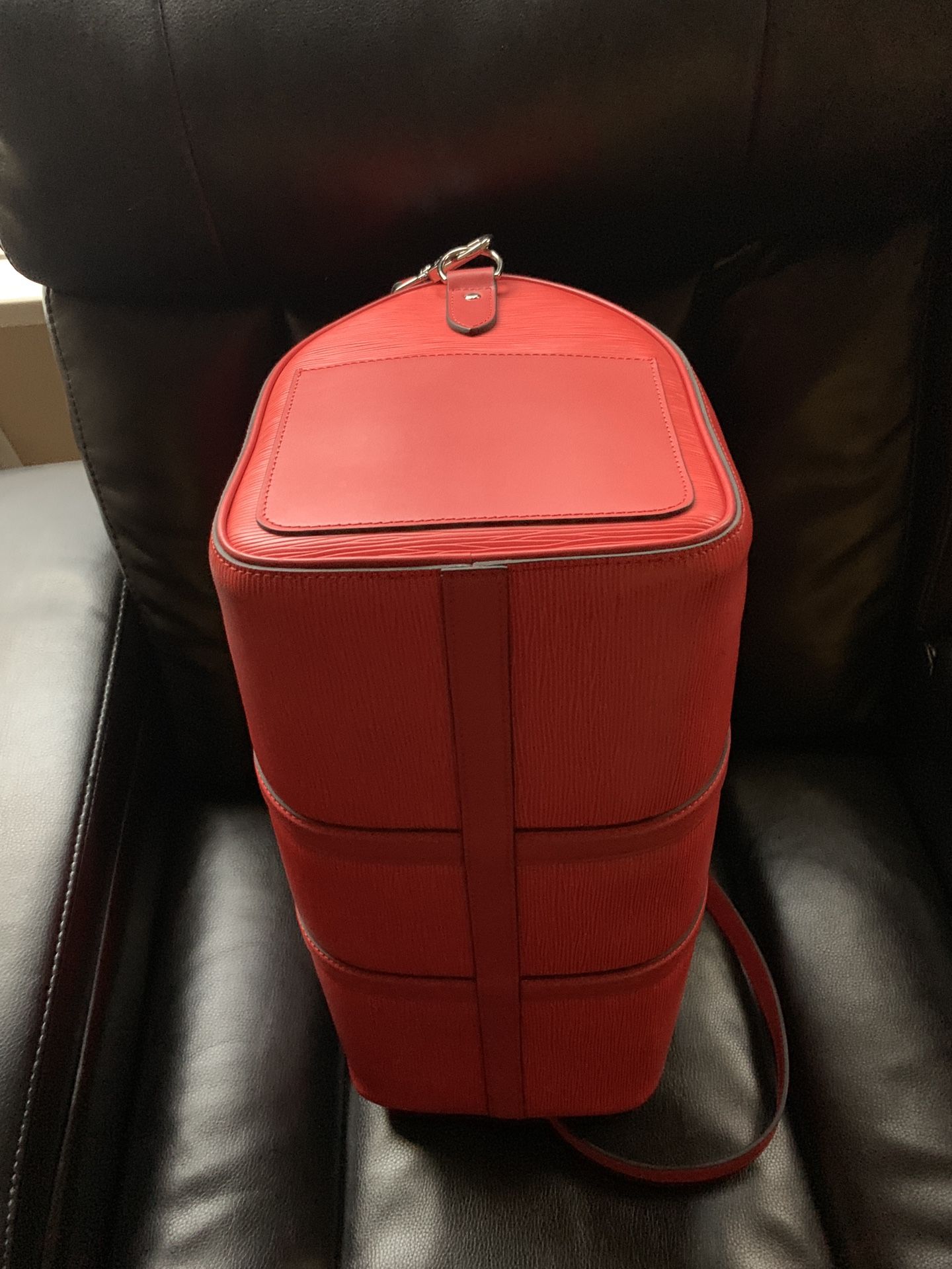 White and red Supreme X Louis Vuitton duffel bag photo – Free