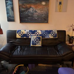 Leather futton couch  double bed
