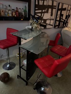 bar with 4 red chairs