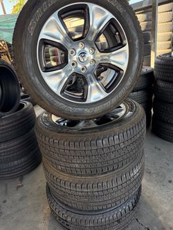 20” New take off dodge ram 1500 6 lug Also fits 6 lug Chevy gmc. New tires 275/55/20 Bridgestone