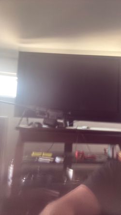 Zenith flatscreen TV 50 inch with stand