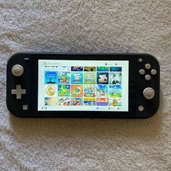 NINTENDO SWITCH LITE MOD + 125 SWITCH GAMES MARIO KART,MARIO PARTY,POKEMON,ZELDA and More
