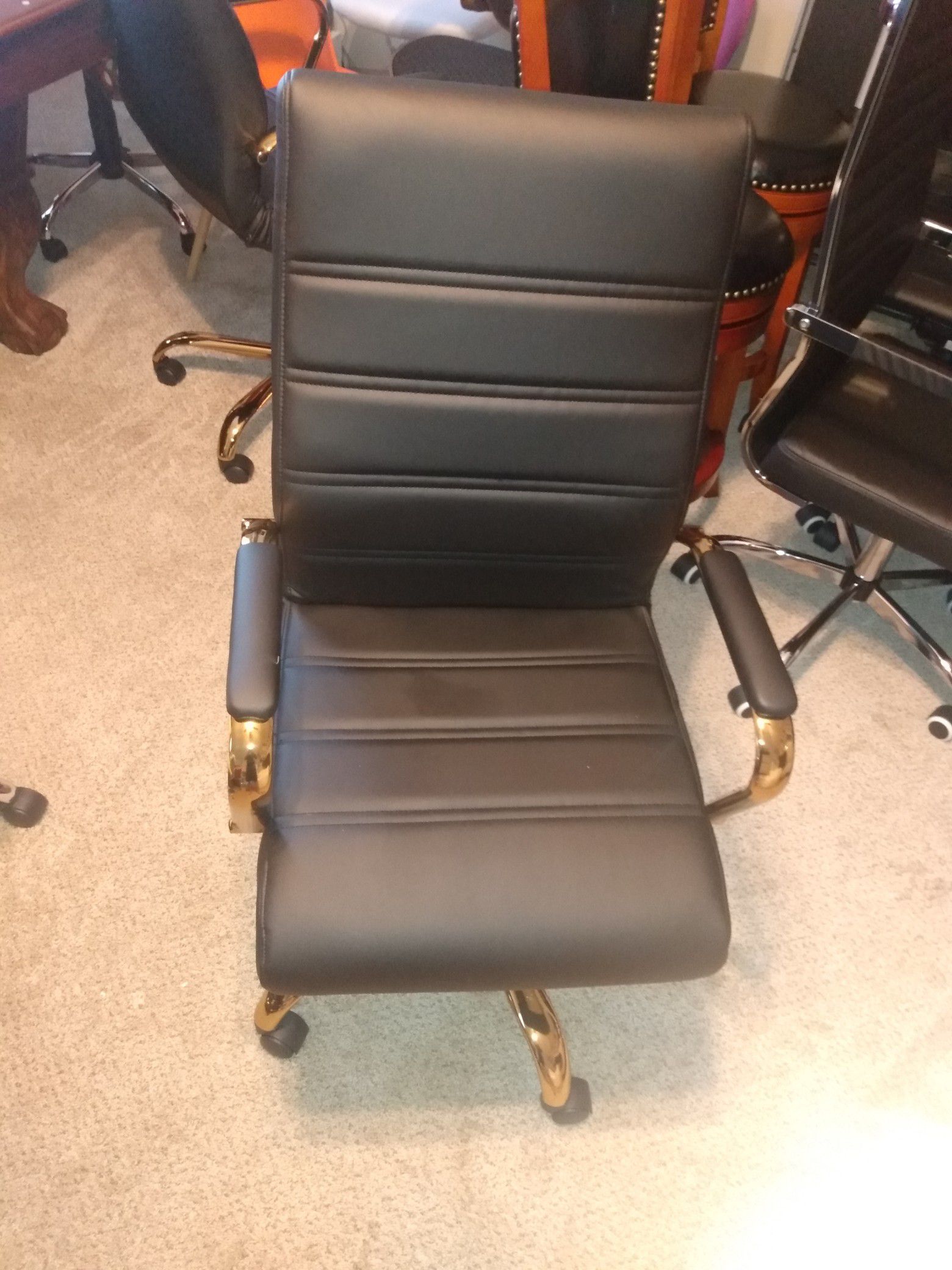 Brand New Black leather office chair with gold trimming