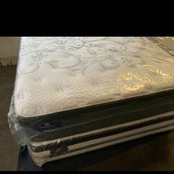 Queen size new thick pillow top. Bed