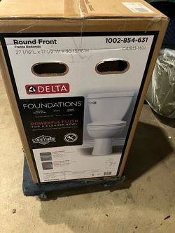 Delta White Foundational Round Front Toilet. New. Never Been Used.