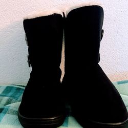 Women’s black boots with faux fur inside size 10-10.5 never used -