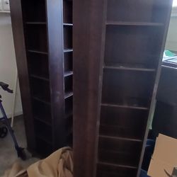 two Home Square 9-shelf narrow revolving bookcases 