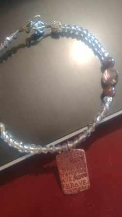 Abalone Crystal and bead wire bracelet with brave charm