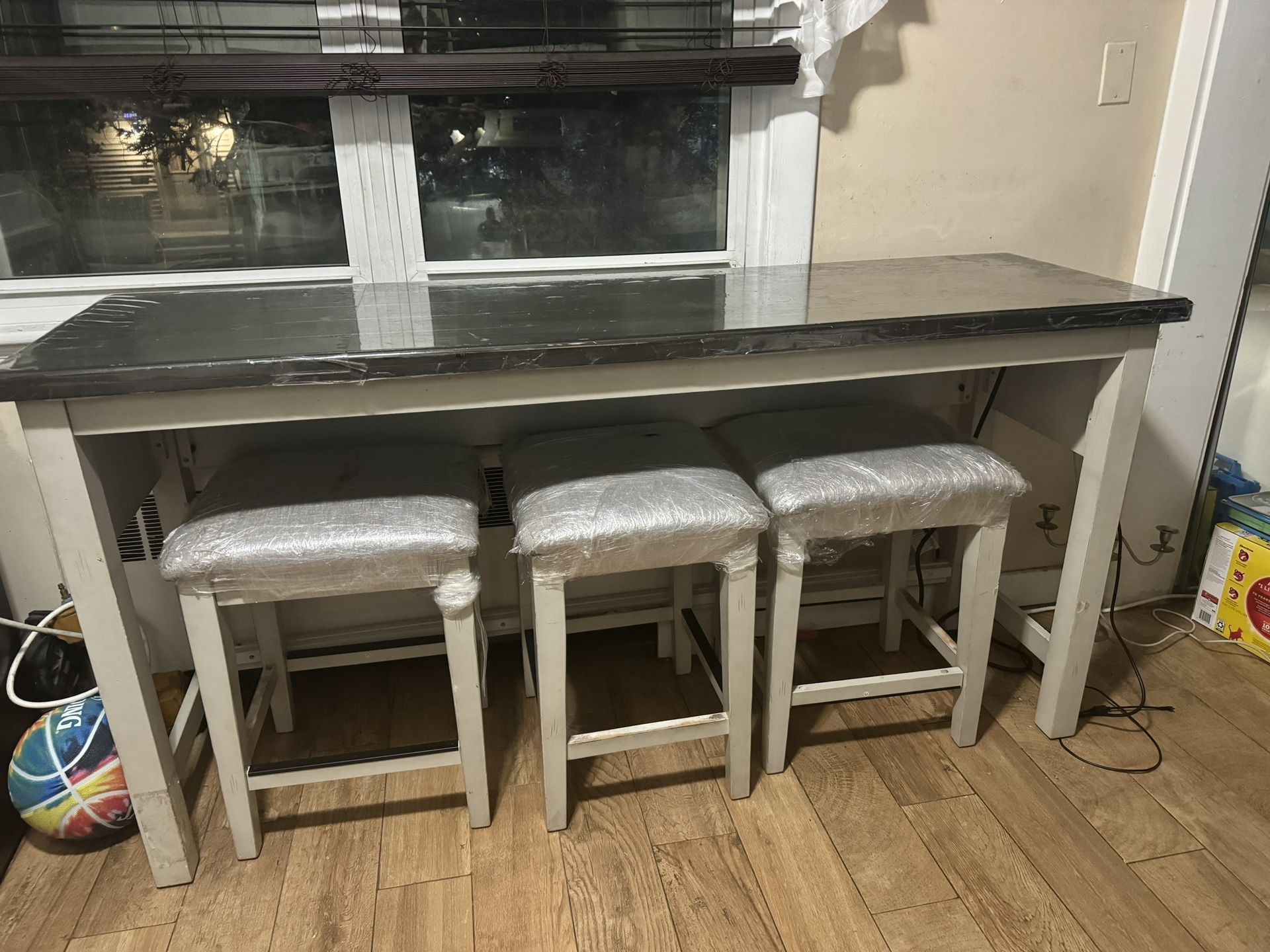 Table And Bar Stools