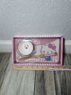 Hello Kitty Pink Ceramic 3 Piece Sushi Set

Dimensions: 
Sushi plate: 9"L x 5"W
Bowl: 3"W x 1.5"H
Chopsticks: 8"L

Brand new,  factory sealed.  Never 